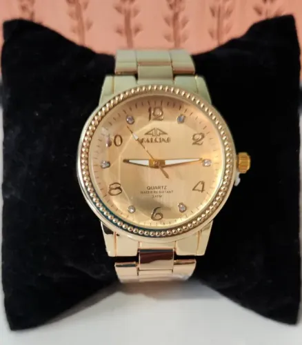 Relógio feminino na cor dourada e rose