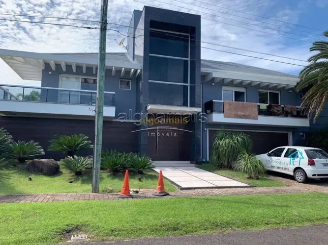 Casa em Condomínio, 6 dormitórios em Condominio Atlantida Ilhas Park, Xangri-Lá REF: CA028