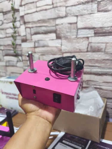 Máquina de cortar laços