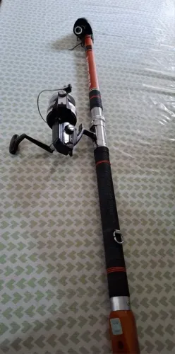Vara de pesca marítima com molinete DAIWA 795M- 47<br>MOLINETE DAIWA ST 700N