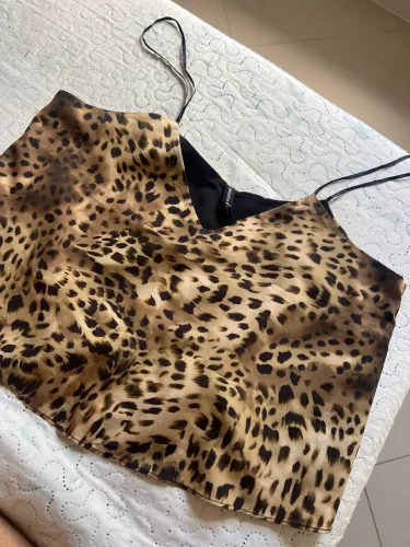 Blusa lança perfume