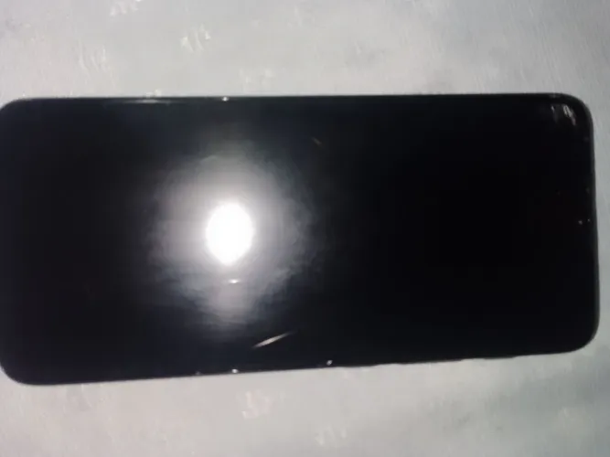 Moto e20 usado com trinca,e com uma abertura do lado do carregador mas carrega normalmente