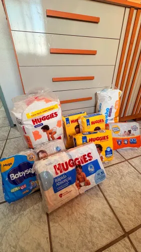 FRALDA DESCARTÁVEL- TAM M E G- HUGGIES, BABYSEC, POMPOM E CAPRICHO