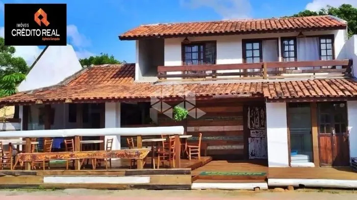 Pousada na Avenida Principal da Praia da Ferrugem