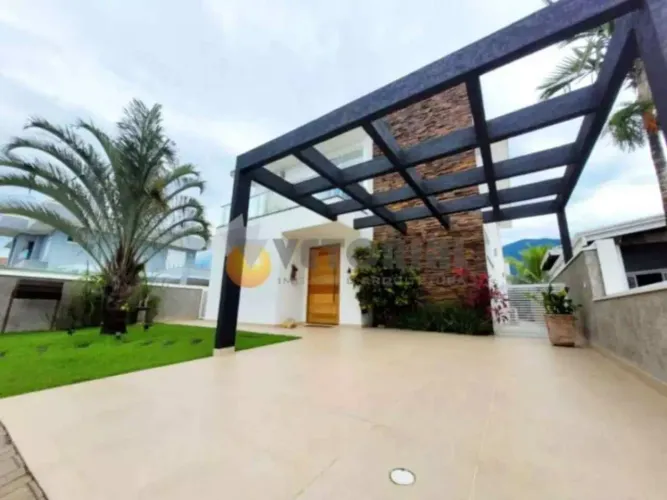 Sobrado com 4 suites, em condominio fechado a venda por R$ 2.700.000 - Costa Nova - Caragu