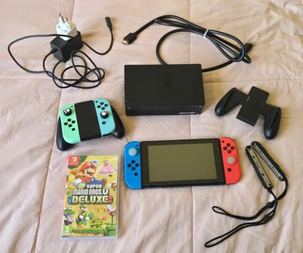Kit Nintendo Switch completo com Dock, Super Mario Bros U Deluxe e Acessórios