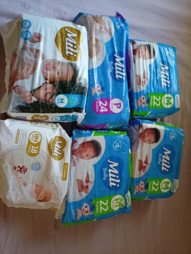 Troco fraldas por tamanho G ou XG 