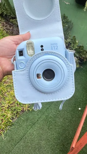 KIT CÂMERA POLAROID FUJIFILM INSTAX MINI 12 ?