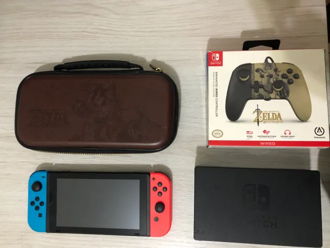 Nintendo switch completo/ Capa Zelda/ Controle Zelda/ 3 jogos