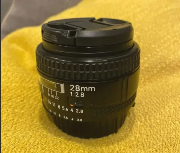 Lente Nikon 28mm F2.8 original, usada mas em ótimo estado de conservação