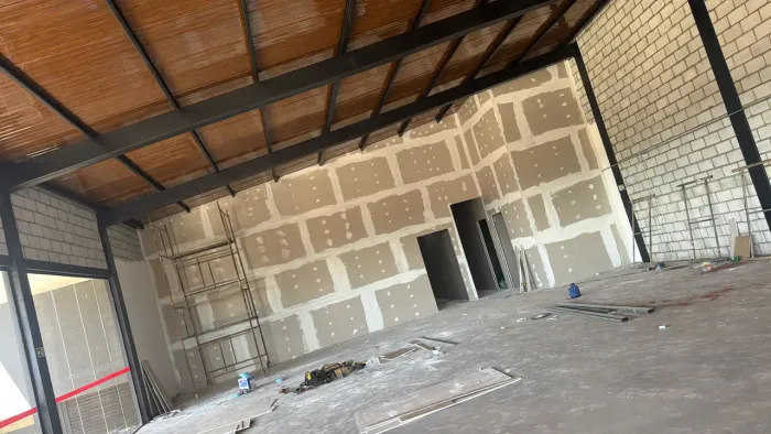 Ajudante ou meio oficial de Dry Wall