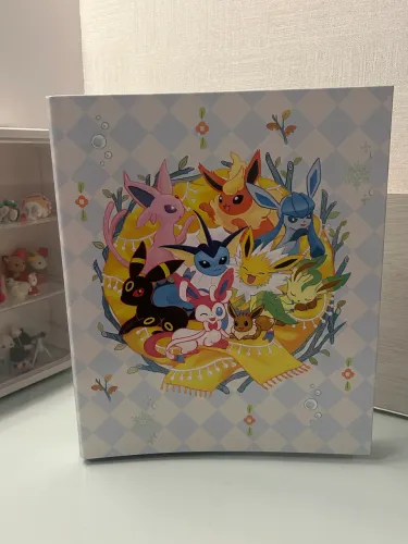Fichário Eeveelutions Pokémon Center 