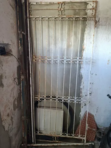Portão de ferro com batedor 