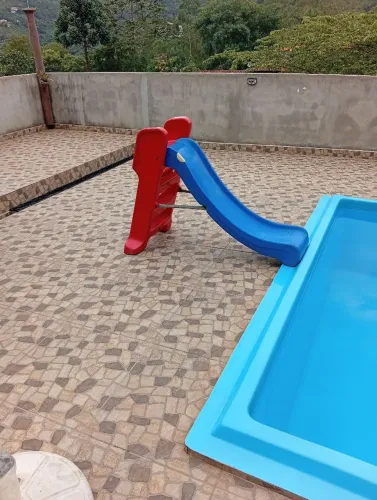 Escorregador de brinquedo para piscina