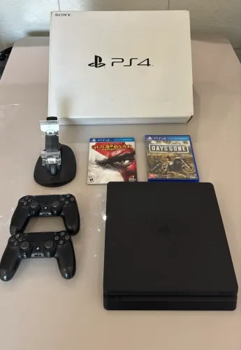Ps4 Slim, 2 Controles, 1 Tb de memória, Com Caixa e vários jogos!! 
