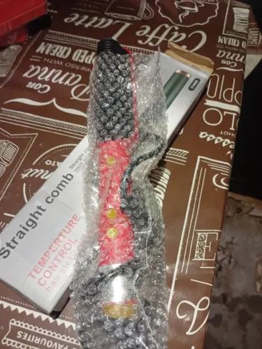 escova alisante semi novo!!