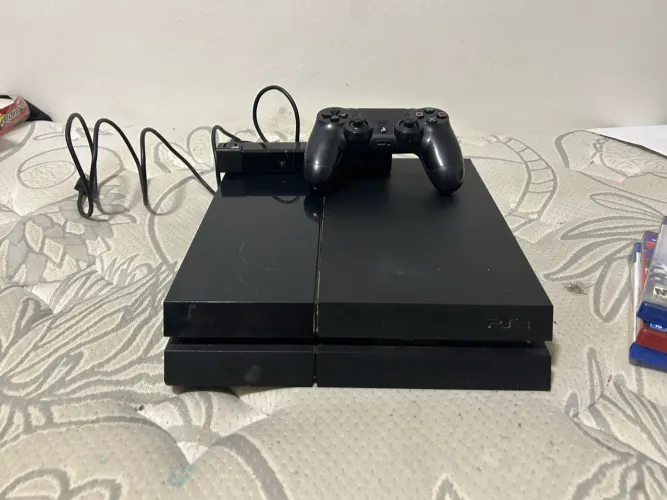 Ps4 + câmera mais 9 jogos