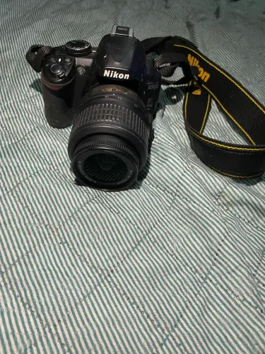 Câmera D3100 + lente 55-300 + tripé
