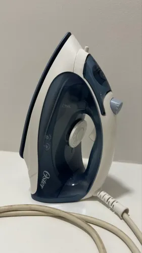 Ferro de passar roupa Oster de cerâmica a vapor 
