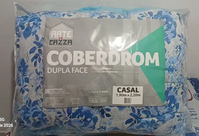 Coberdrom tamanho padrão na cor azul e cinza , produto novo