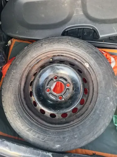Pneu com calha de ferro ARO 14
