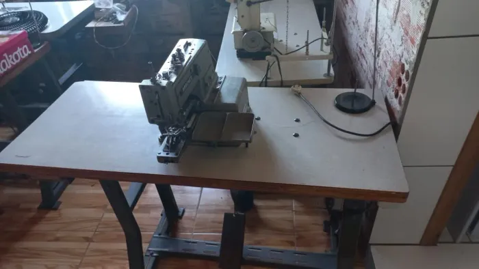 Máquina de pregar botão 