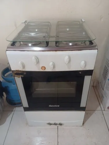 Fogão 4 bocas completo com pezinhos e forno funcionando perfeitamente 