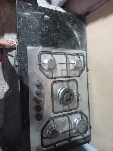 Bancada de mármore com fogao