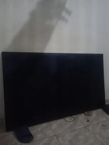 Tv OLED 55 polegadas, com defeito, retirada de peça