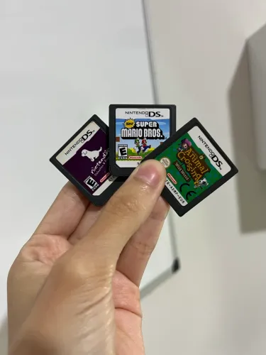 3 jogos nintendo ds; animal crossing wild world, new super mario bros, nintendogs