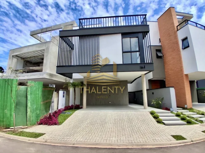CASA EM CONDOMÍNIO com 3 dormitórios à venda por R$ 1.540.000,00 no bairro Santa Cândida -