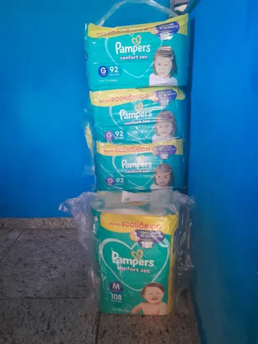 Fraldas descartavel pampers comfort sec tamanho M e G