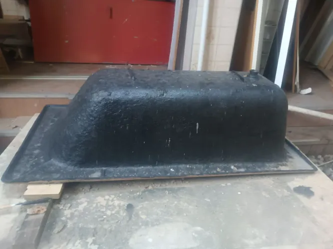 Banheira de ferro pesada.
