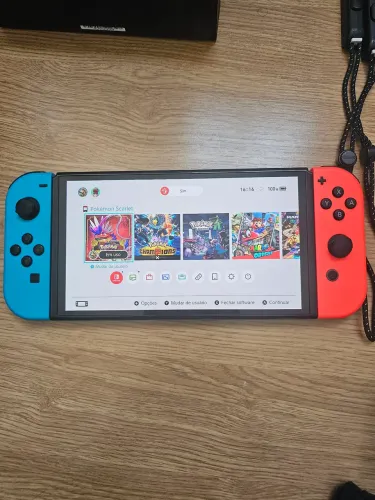 Nintendo Switch OLED + Mario Kart + Acessórios