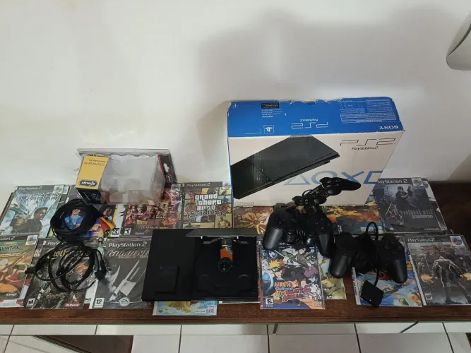Playstation 2 + Caixa + Dois Controles + 20 jogos no CD + Cabos Originais