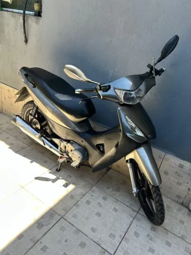 Biz 125/ R. liga e freio a disco