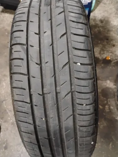 Pneu Dunlop seminovo.