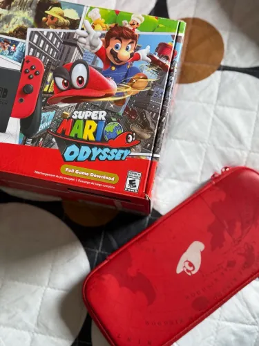 Nintendo Switch Super Mario Odyssey Bundle - Caixa e Case