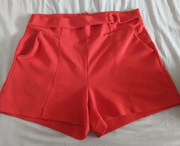 Short laranja que veste 50/52