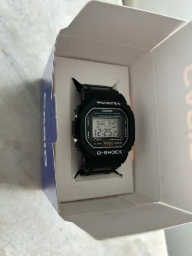 Relógio Casio G-shock Dw 5600 anos 80 Série Prata Fundo Rosca