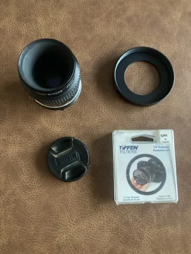 Lente Nikon AI AIS 55mm 2.8 Macro com filtro UV e step up Ring