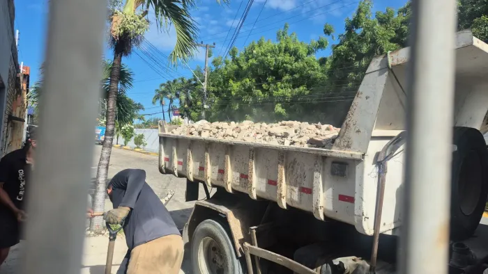 Areia grossa  e retirada de entulho