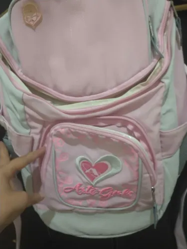 Mochila rosa de criança novinha
