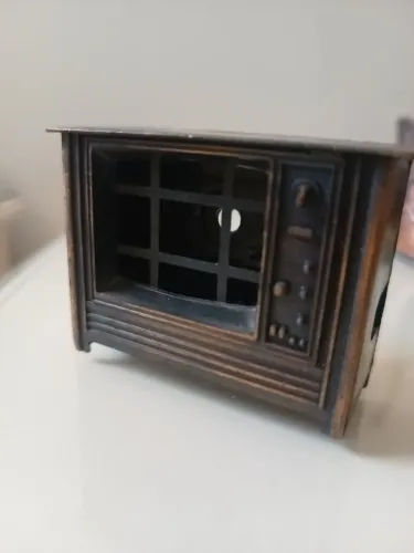 Miniatura de tv antiga apontador