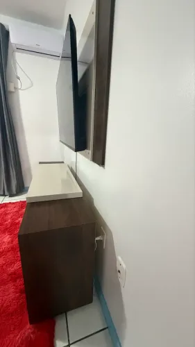 Vendo rack com painel para Tv Ideal para sala de estar. Motivo da mudanca