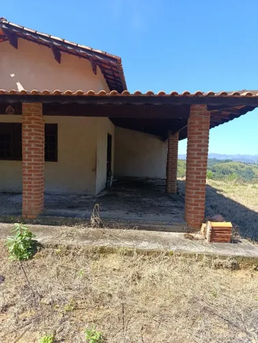 Vendo terreno com casa em construção Extrema MG