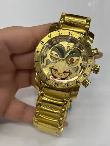 Relógio Dourado Quartzo Joker Fundo de Vidro a Bateria Envio Rápido