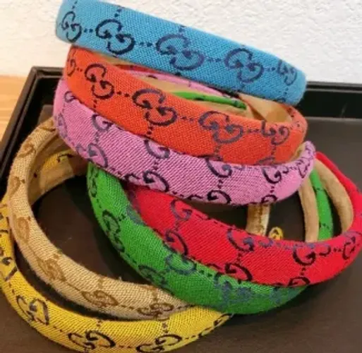 Tiara Gucci roxo