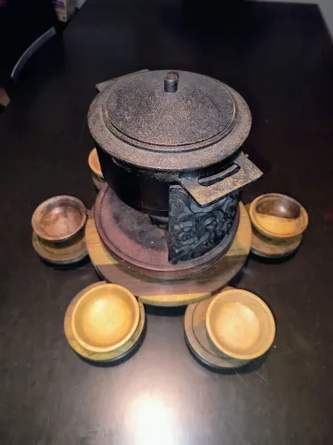 Panela de fondue de ferro fundido