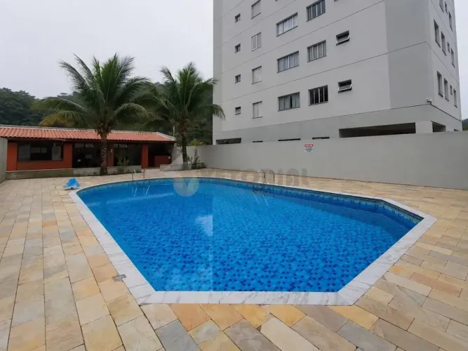 Apartamento com 2 dormitórios à venda, 58 m² por R$ 360.000,00 - Massaguaçu - Caraguatatub